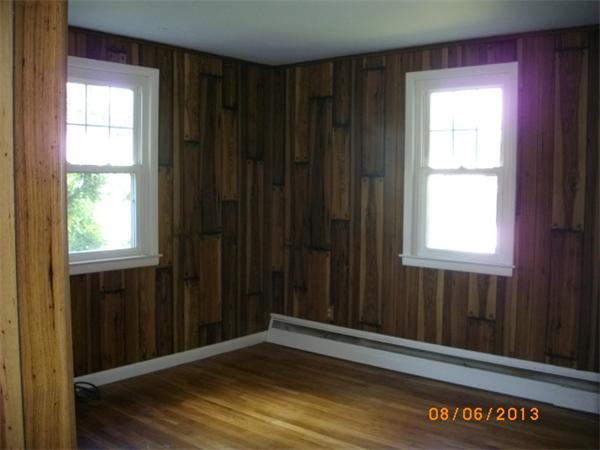 109 Cheyenne Road Springfield, MA 01109 - Photo 3 of 4 a view of an empty room with wooden floor