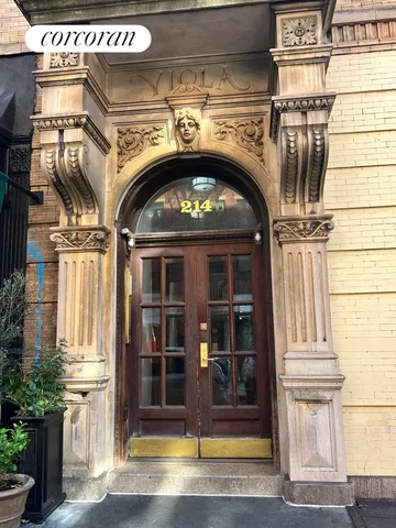 a bathroom with a sink and a washer dryer