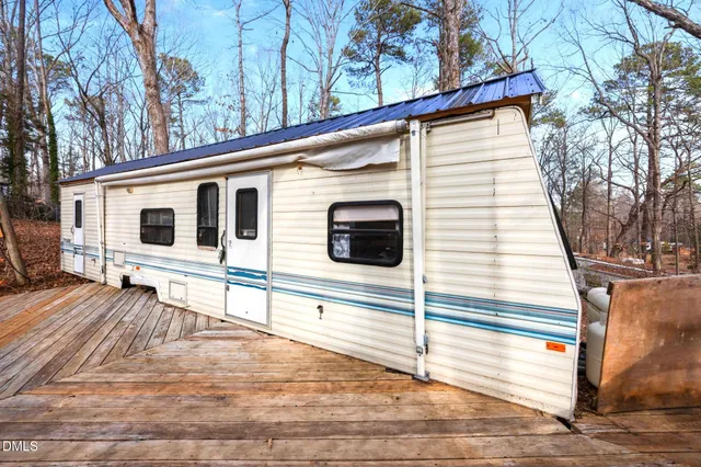 a view of a kitchen with furniture and a window