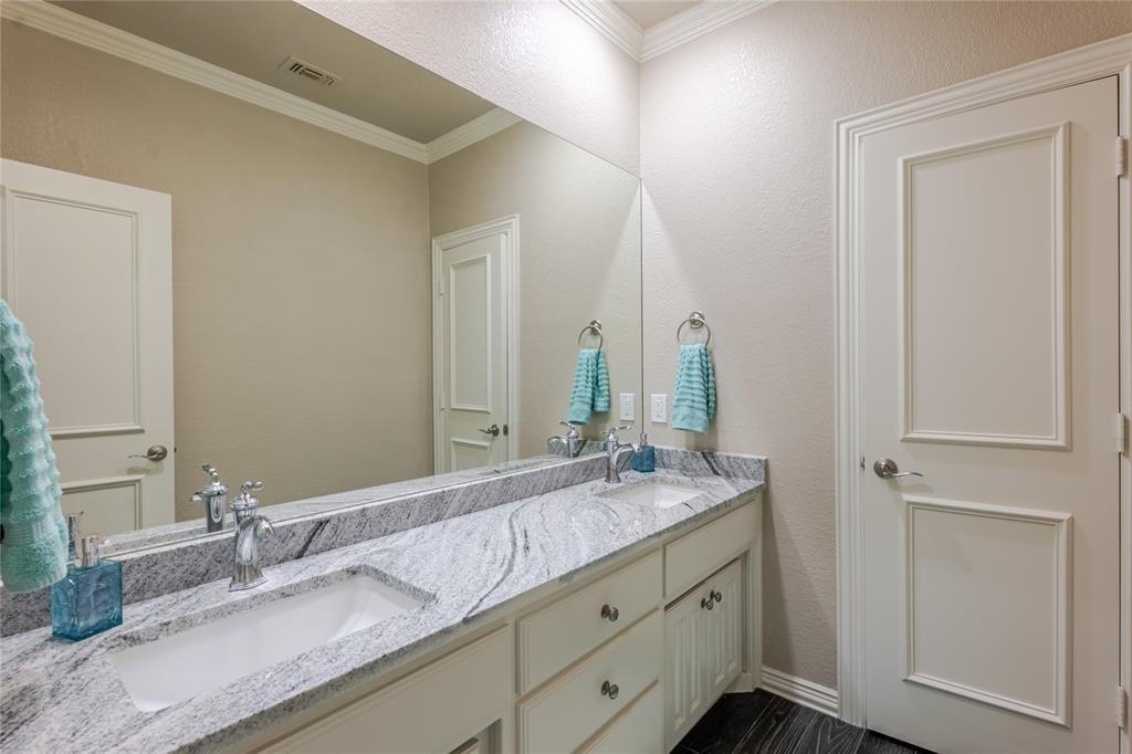 166 East Rio Ridge Azle, TX 76020 - Photo 30 of 40 a bathroom with double sink and a mirror