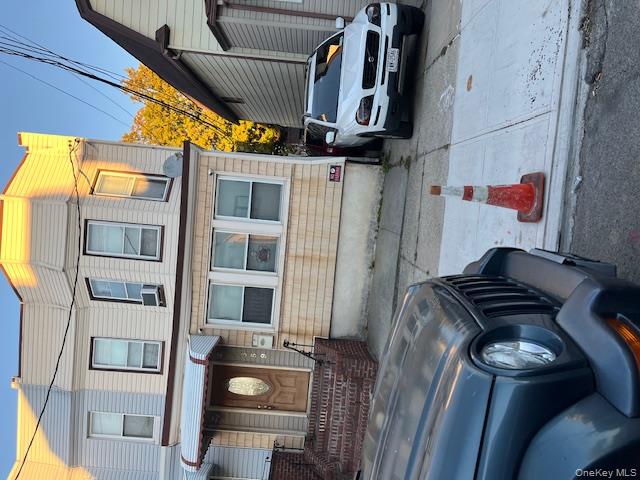 a car parked in front of a house