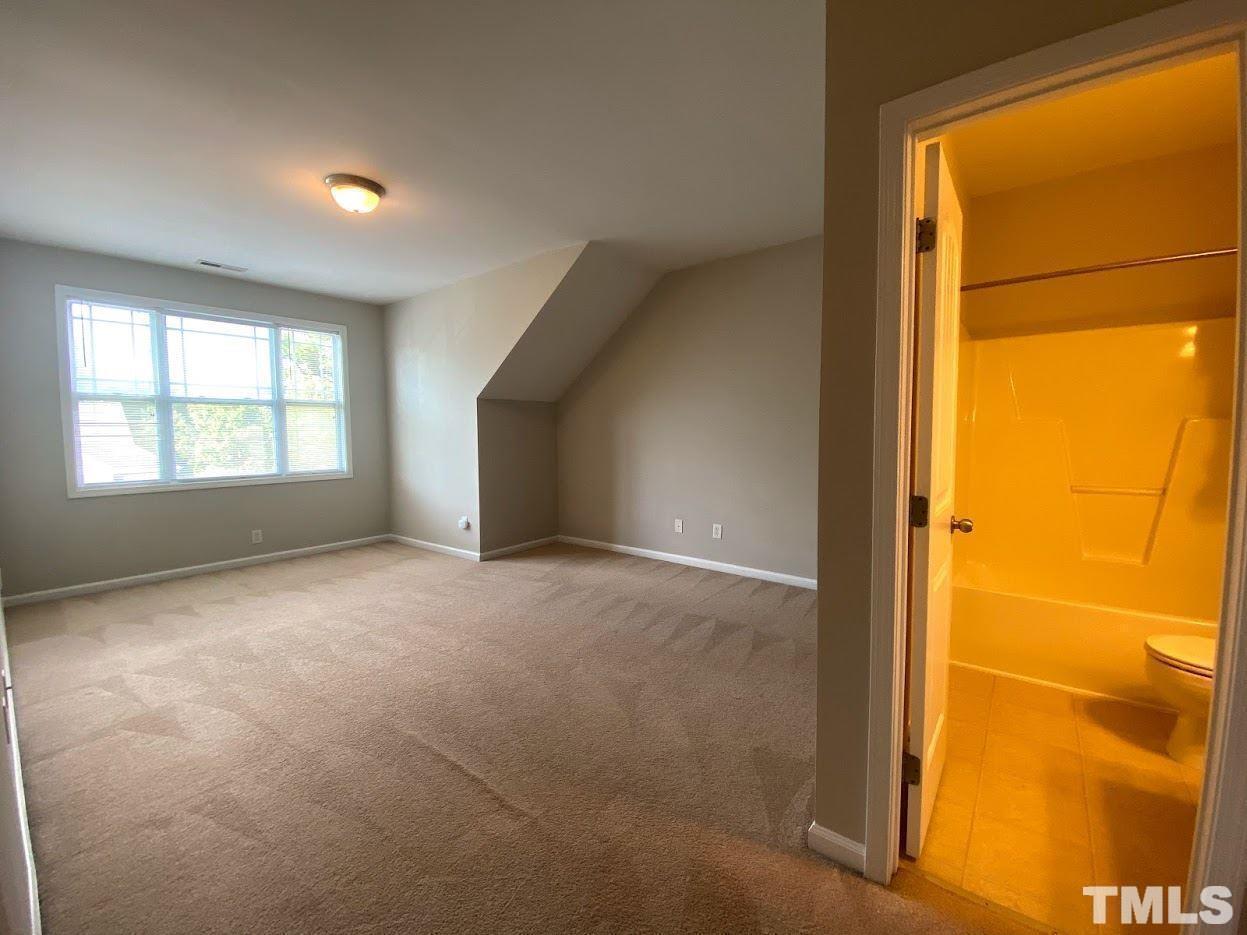 5105 Powell Townes Way Raleigh, NC 27606 - Photo 11 of 14 a view of an empty room with a window