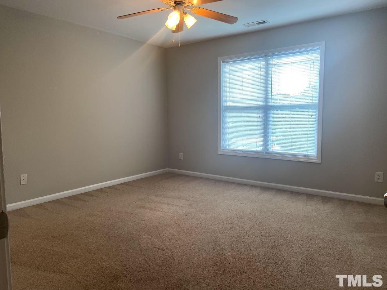 5105 Powell Townes Way Raleigh, NC 27606 - Photo 7 of 14 an empty room with a window