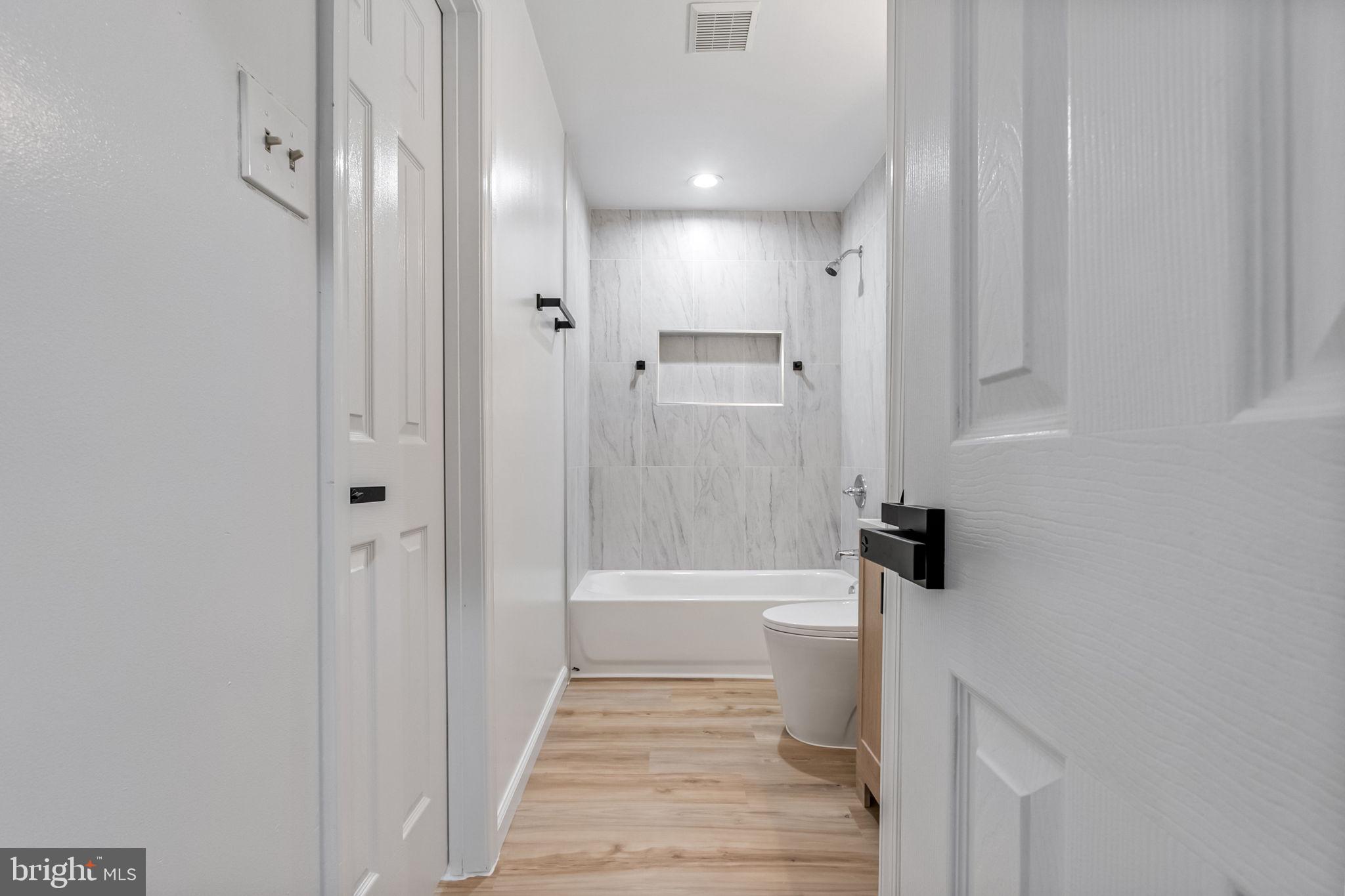 3 Boston Cove Ruther Glen, VA 22546 - Photo 19 of 30 a bathroom with a sink and a shower