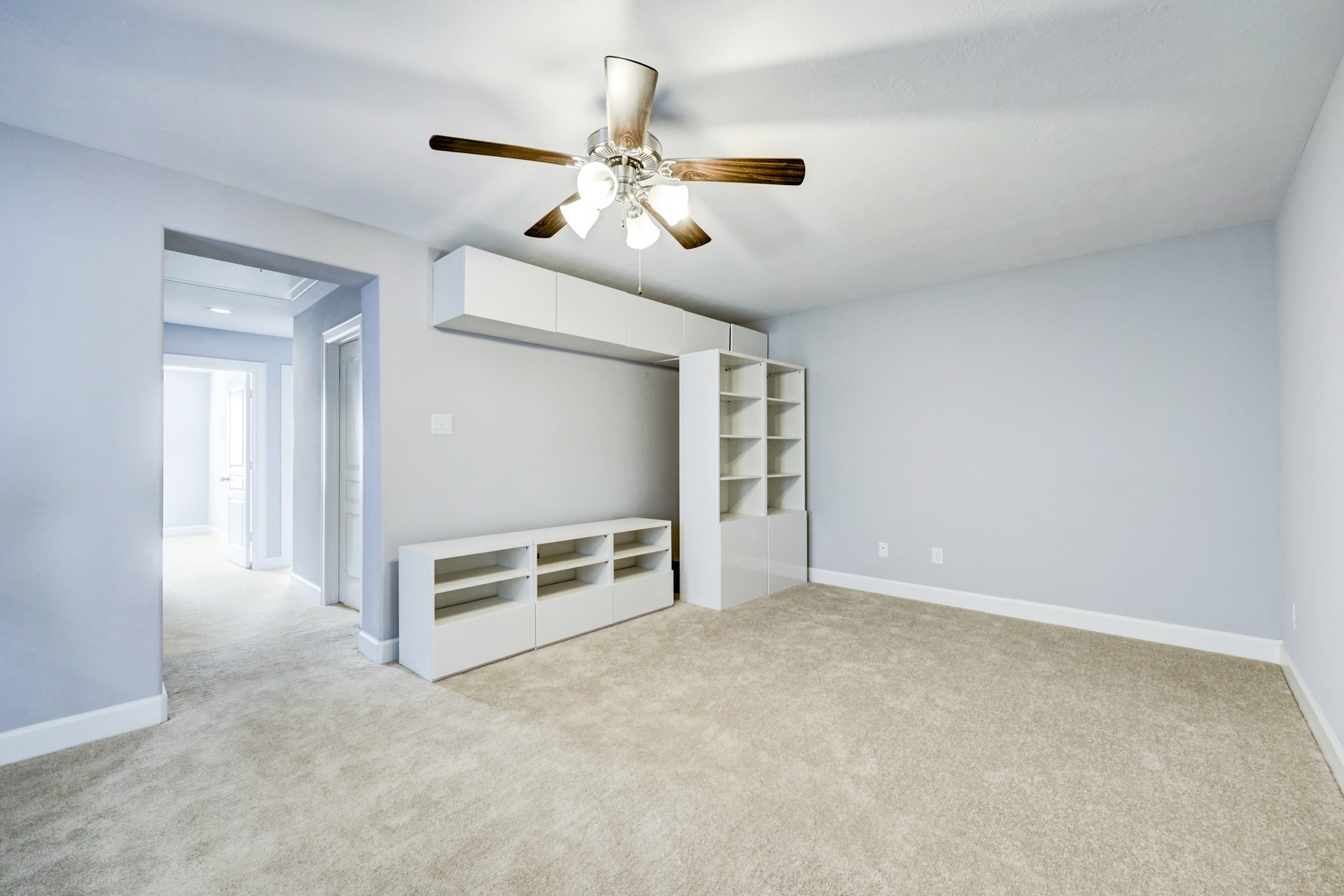 1811 Wichita Street, Unit A Houston, TX 77004 - Photo 23 of 29 an empty room with windows and ceiling fan