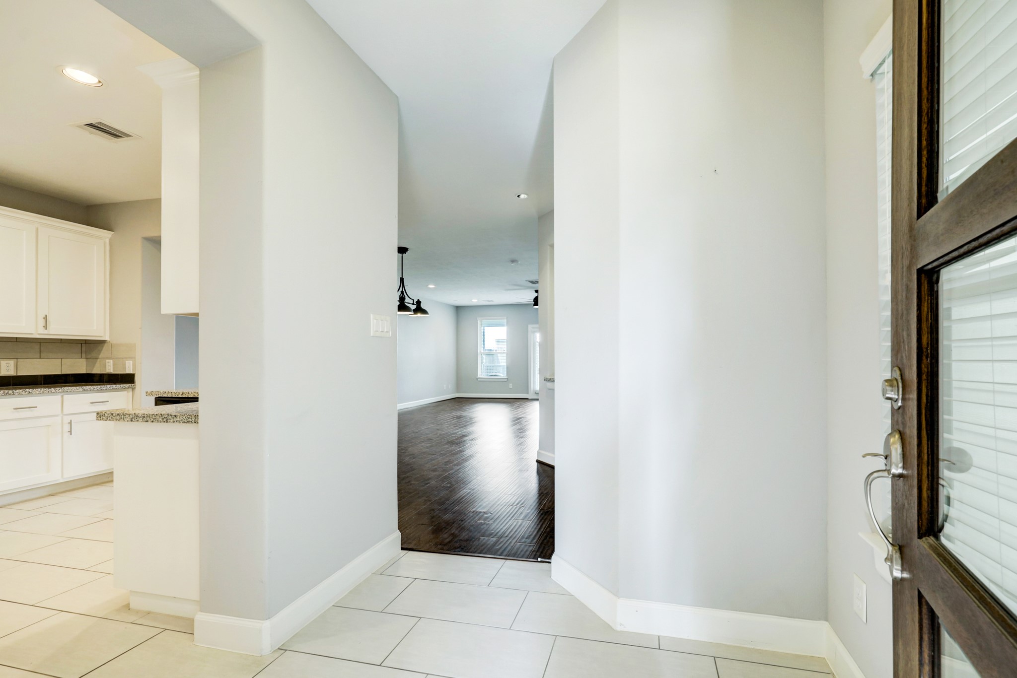 1811 Wichita Street, Unit A Houston, TX 77004 - Photo 6 of 29 a view of a kitchen from the hallway