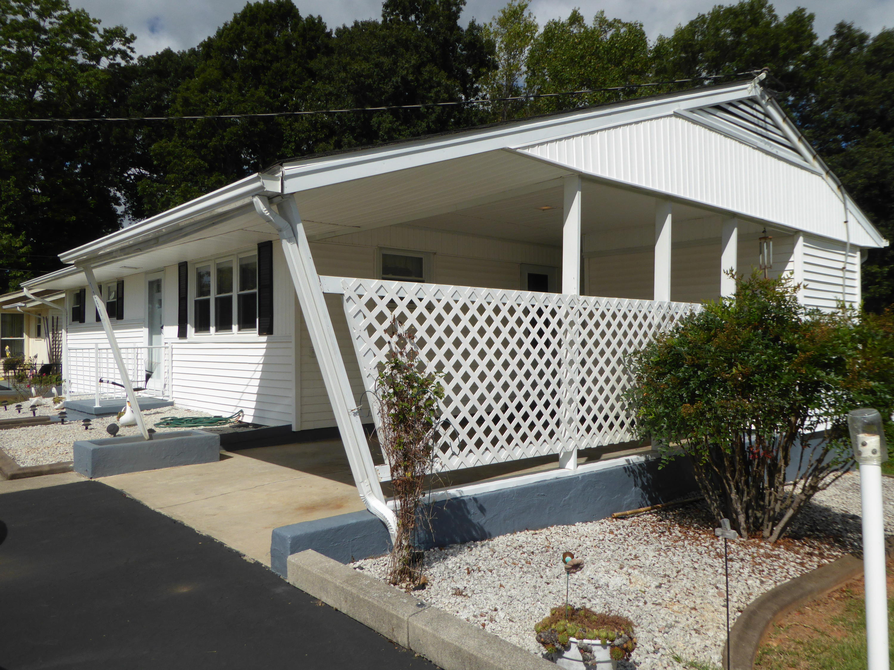 1290 Scuffling Hill Road Rocky Mount, VA 24151 - Photo 34 of 36 27 Carport Side of Home