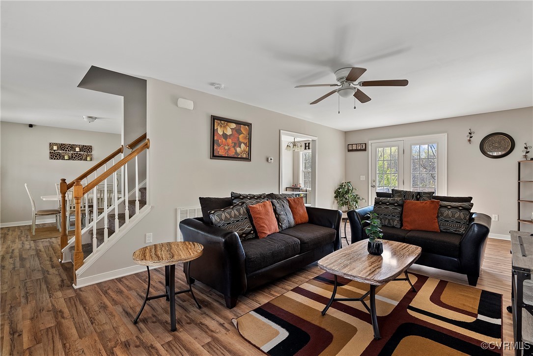 7553 Rolling Hill Road Hopewell, VA 23860 - Photo 8 of 35 Living room with ceiling fan and dark hardwood / w