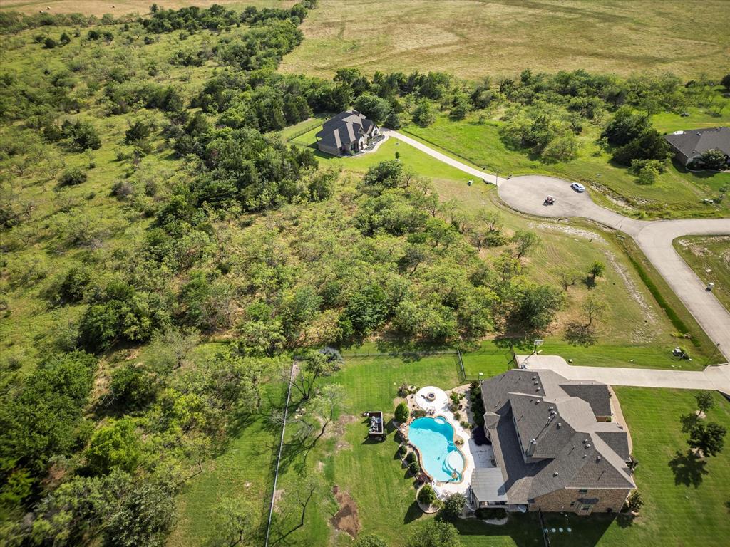 540 Austin Circle, Unit A Terrell, TX 75160 - Photo 4 of 11 a view of a lake with a house
