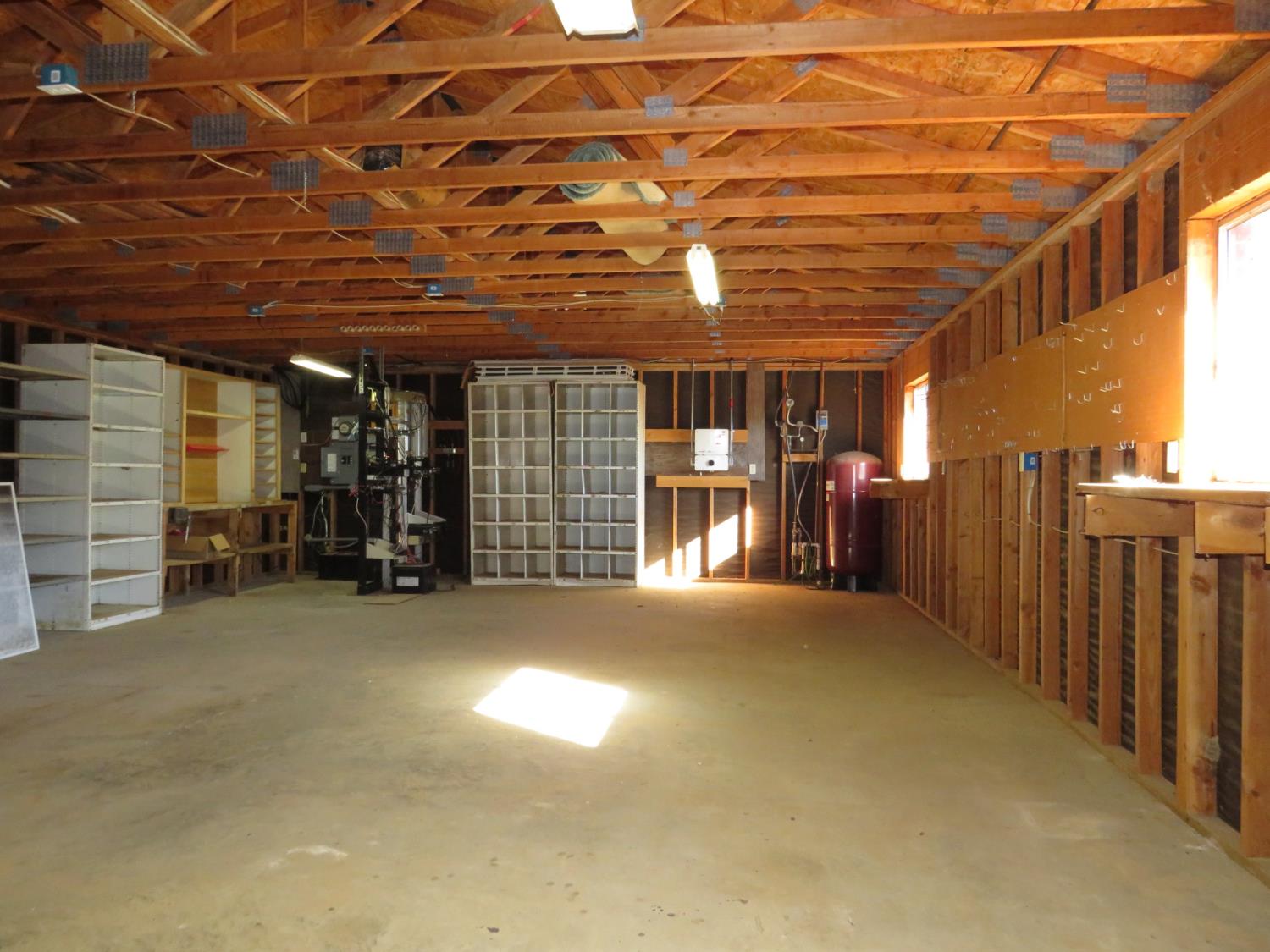 31180 Knob Cone Road Gold Run, CA 95717 - Photo 61 of 70 Lots of storage and organizers in the garage along with a 1/2 bath.