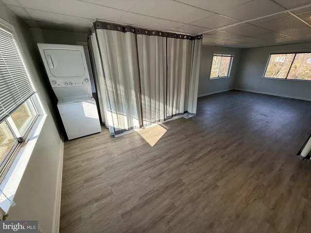 a view of entryway with wooden floor
