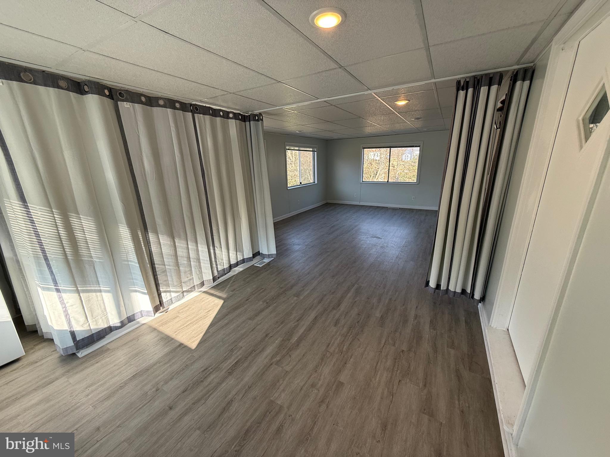 1214 Reece Road Severn, MD 21144 - Photo 7 of 25 a view of entryway with wooden floor