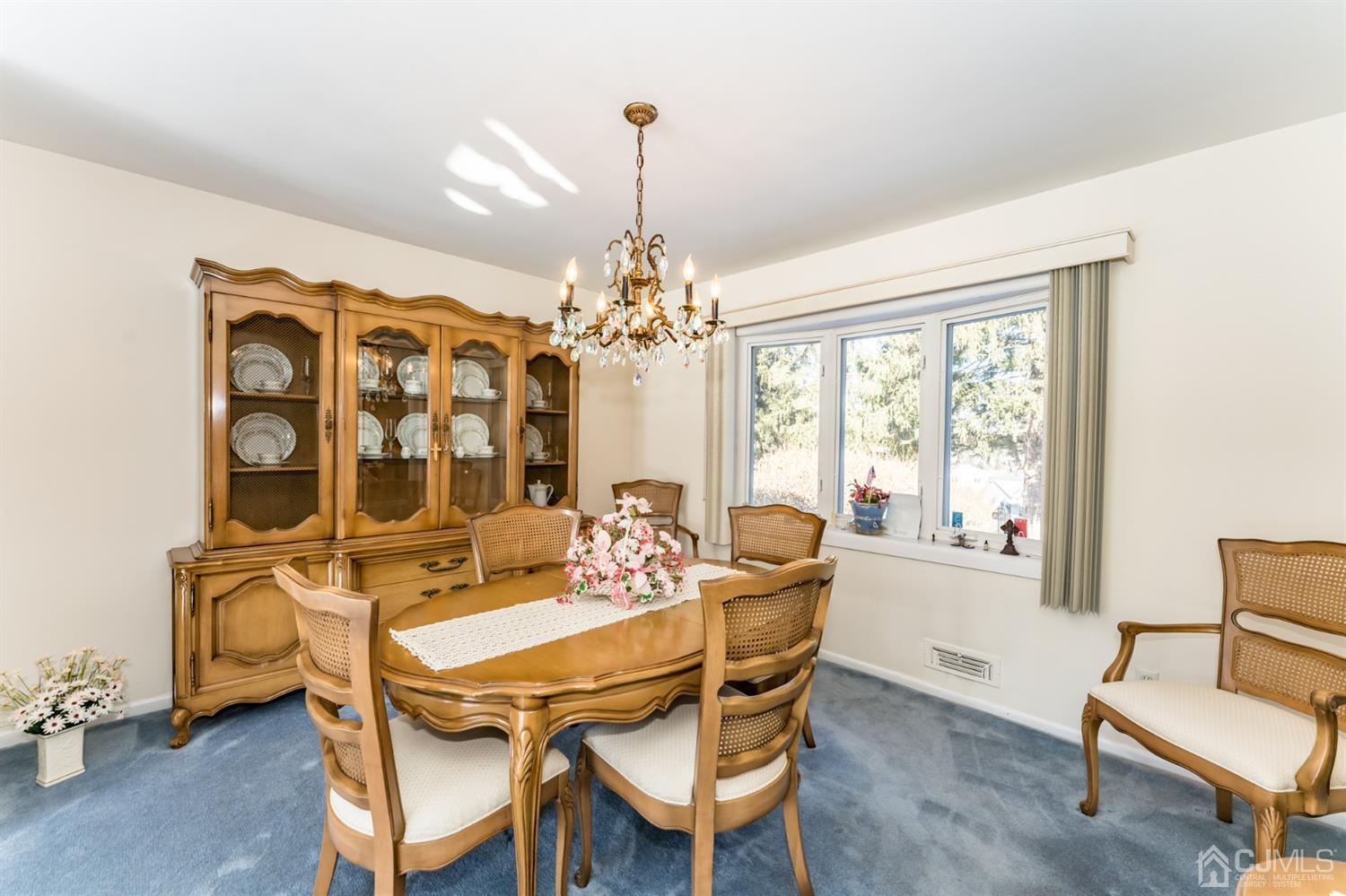 283 Baltusrol Way Springfield, NJ 07081 - Photo 6 of 20 a dining room with furniture and window