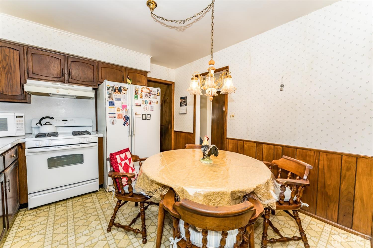 283 Baltusrol Way Springfield, NJ 07081 - Photo 8 of 20 a very nice looking dining room with a table and chairs