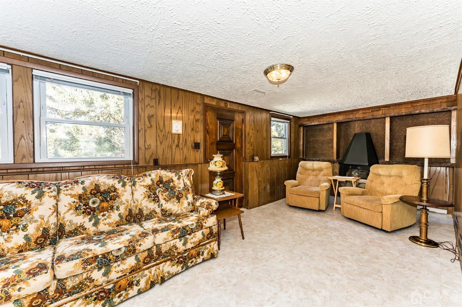 283 Baltusrol Way Springfield, NJ 07081 - Photo 10 of 20 a bedroom with furniture and a large window