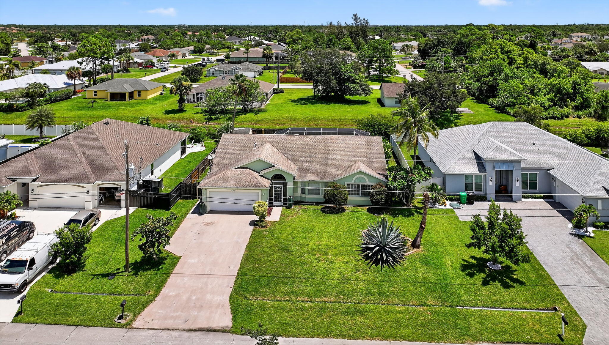 2631 Southwest Fair Isle Road Port St. Lucie, FL 34987 - Photo 2 of 59 63-web-or-mls-DJI_20250705170405_0371_D