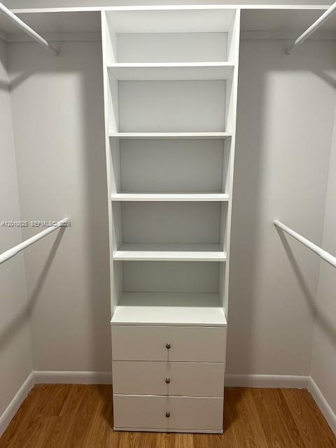 3920 Inverrary Boulevard, Unit 204C Lauderhill, FL 33319 - Photo 15 of 19 a view of walk in closet with empty racks