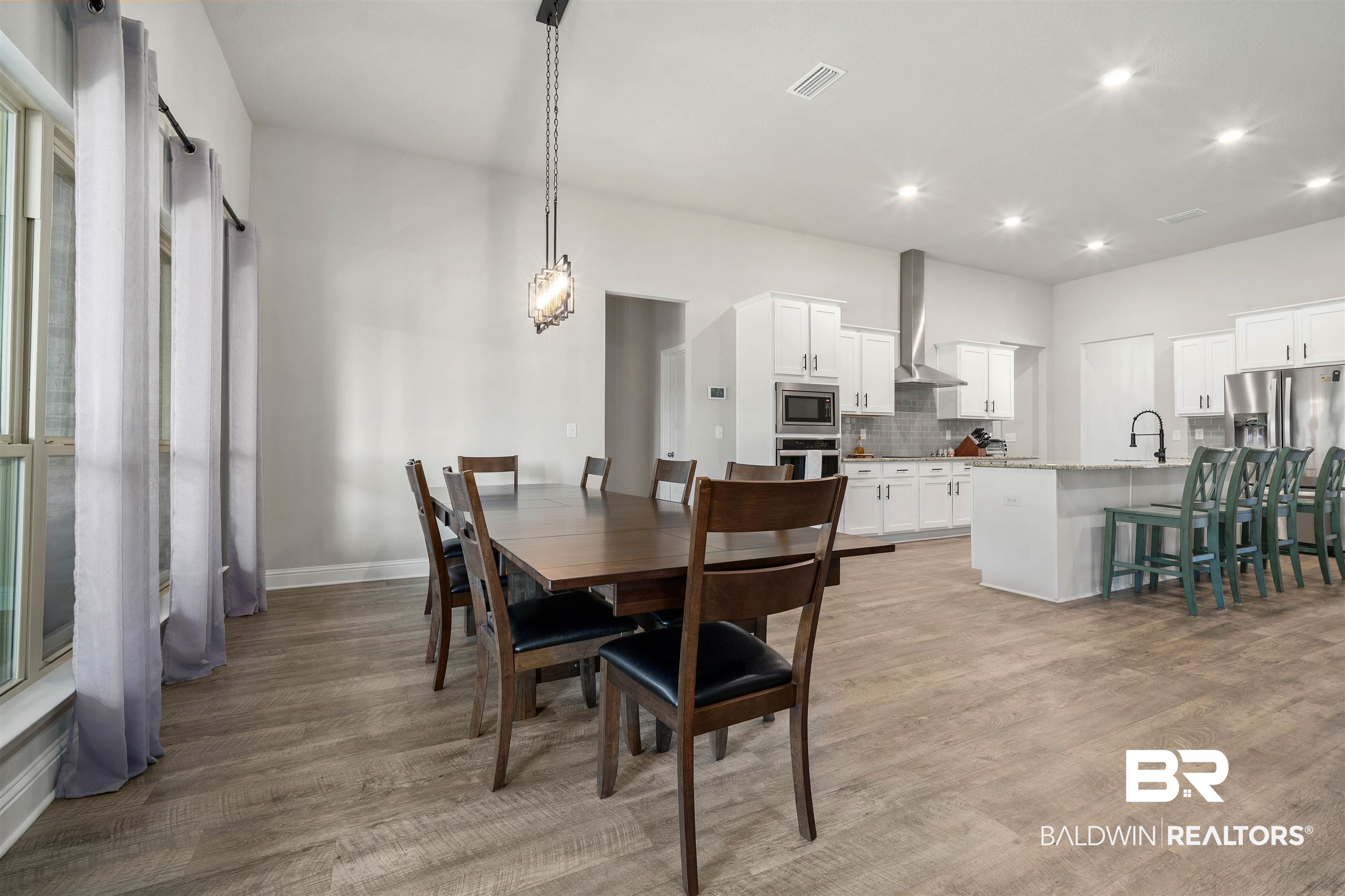 1700 Gwin Court Mobile, AL 36695 - Photo 16 of 36 Dining area with light wood-type flooring and recessed lighting