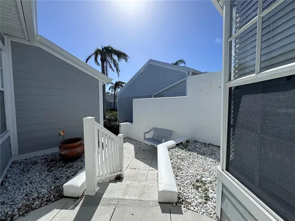 a view of a back yard of the house