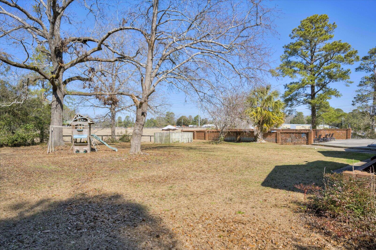 2945 Wagener Road Aiken, SC 29801 - Photo 36 of 47 a view of outdoor space with garden and trees