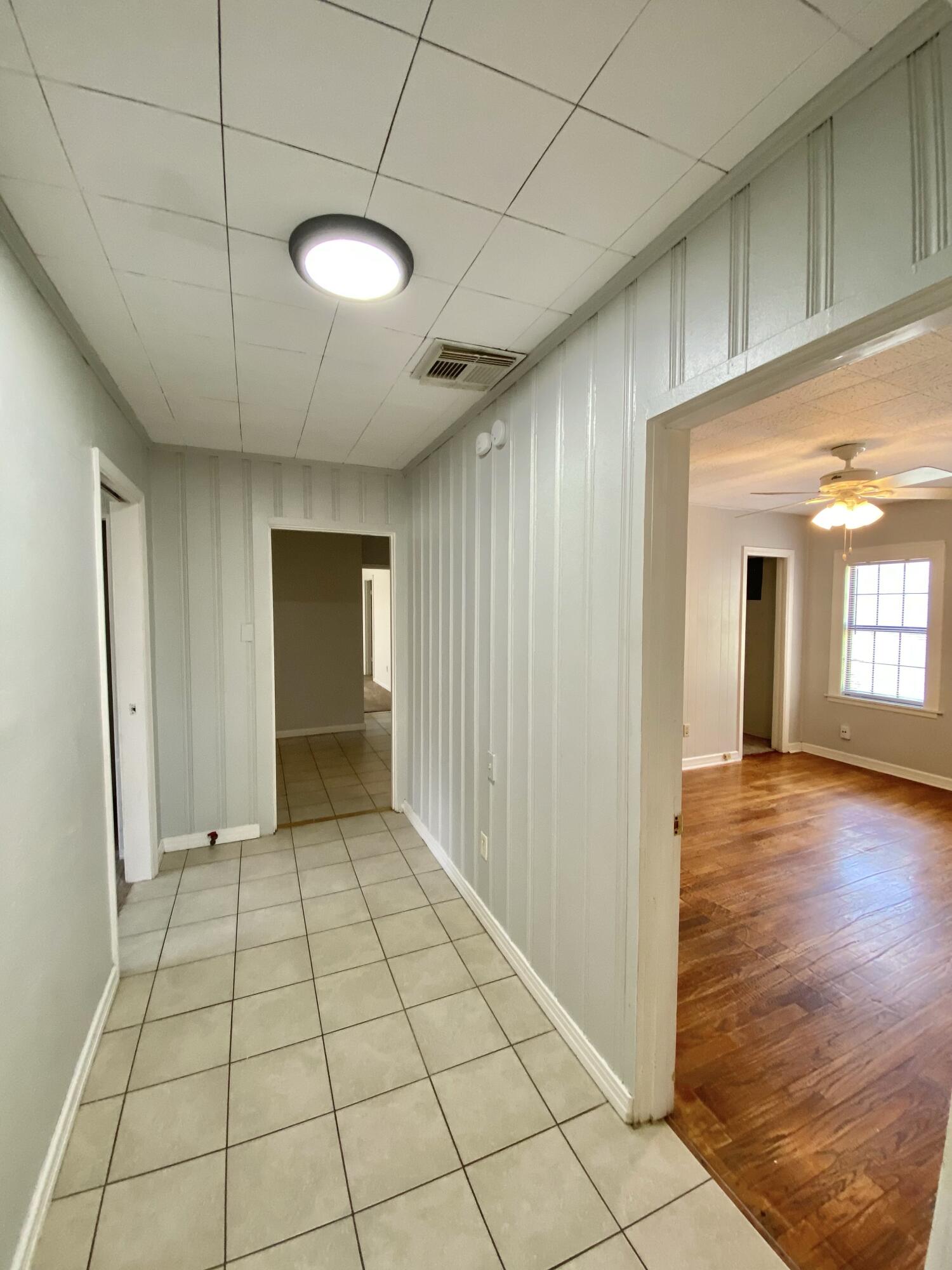 2209 28th Street Lubbock, TX 79411 - Photo 5 of 12 a view of an empty room and window