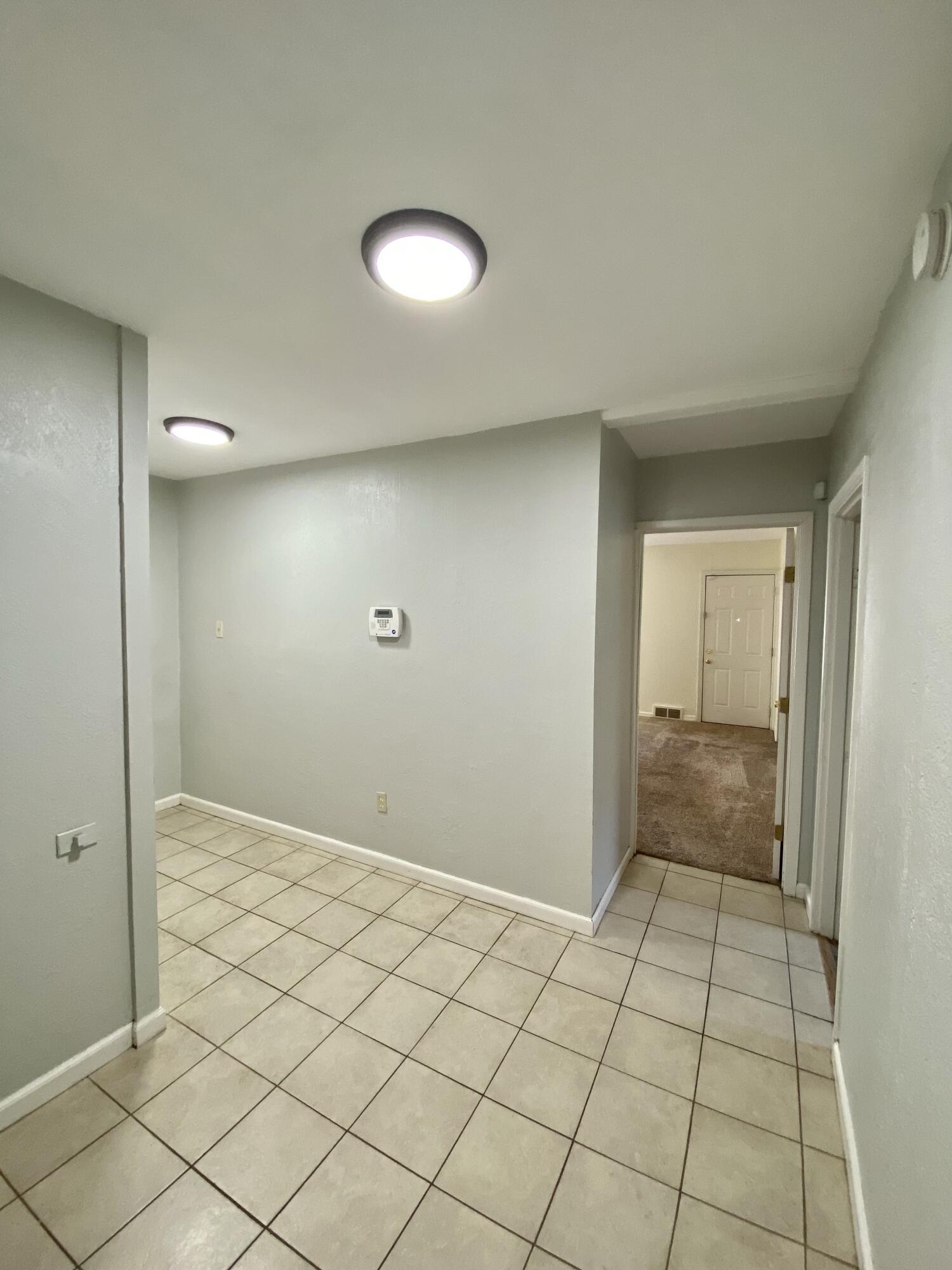 2209 28th Street Lubbock, TX 79411 - Photo 7 of 12 a view of an empty room