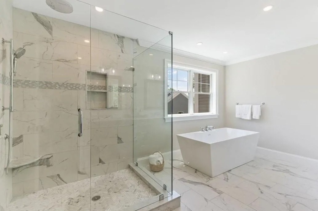 56 Blossomcrest Road Lexington, MA 02421 - Photo 15 of 19 a spacious bathroom with a tub sink shower and mirror