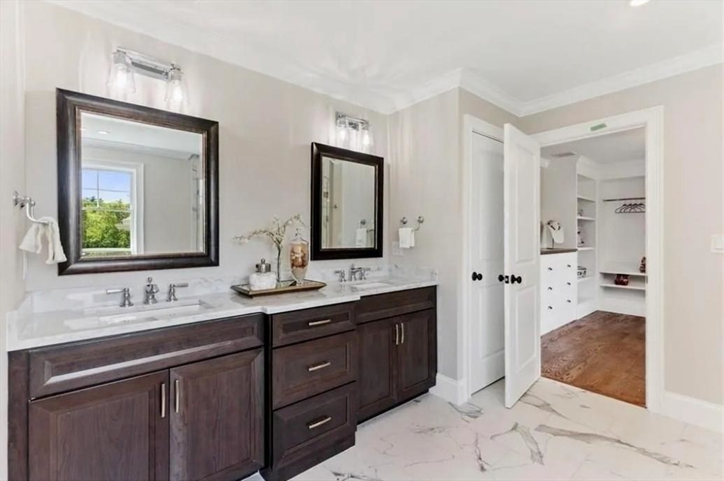 56 Blossomcrest Road Lexington, MA 02421 - Photo 16 of 19 a bathroom with a double vanity sink mirror and double
