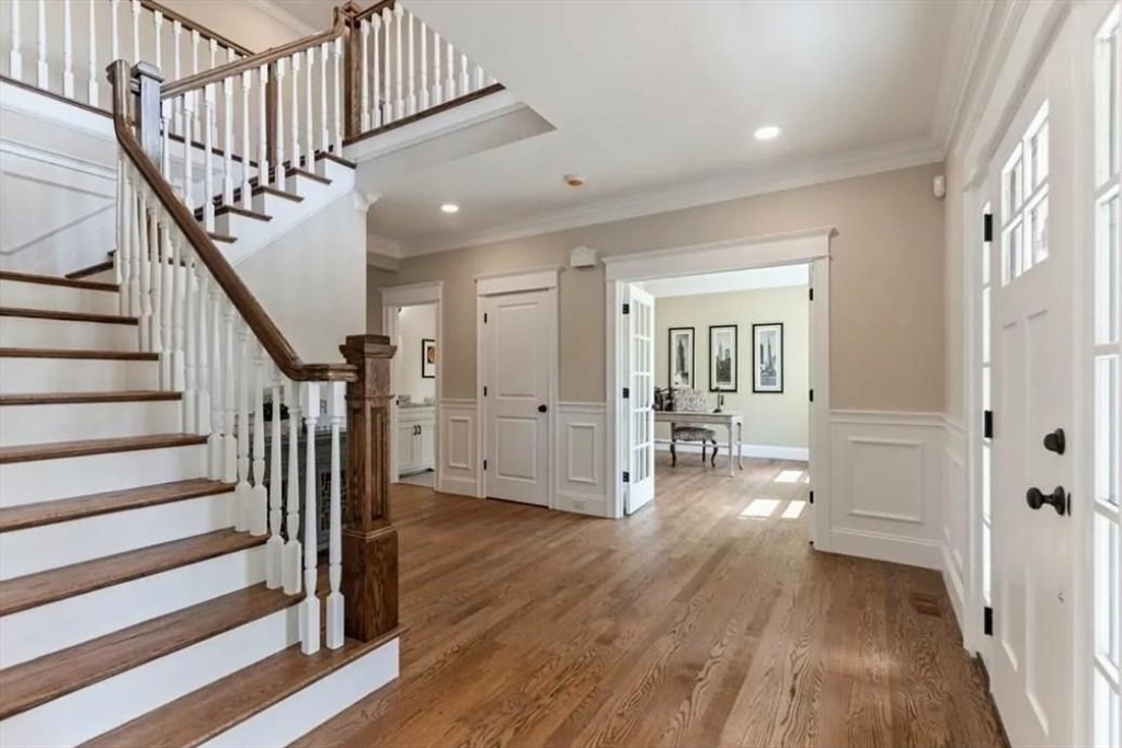 56 Blossomcrest Road Lexington, MA 02421 - Photo 3 of 19 a view of entryway with wooden floor and stairs