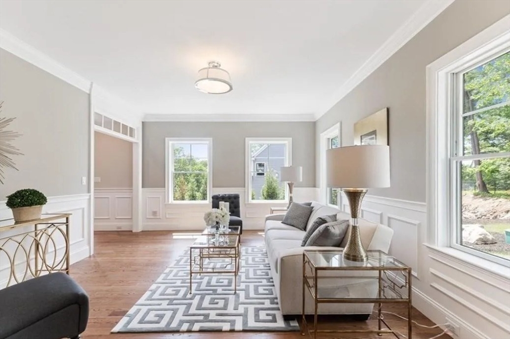 56 Blossomcrest Road Lexington, MA 02421 - Photo 6 of 19 a living room with furniture large window and a table