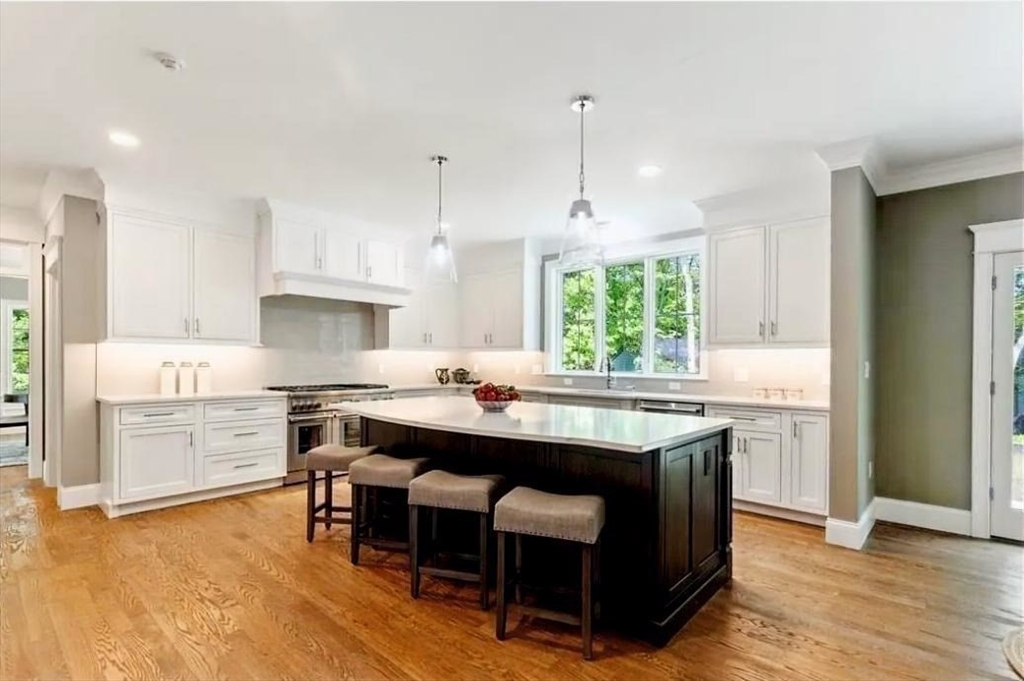 56 Blossomcrest Road Lexington, MA 02421 - Photo 7 of 19 a kitchen with stainless steel appliances granite countertop a stove a sink dishwasher and a refrigerator with wooden floor