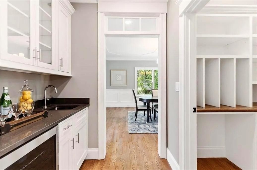 56 Blossomcrest Road Lexington, MA 02421 - Photo 10 of 19 a kitchen with granite countertop a sink and cabinets