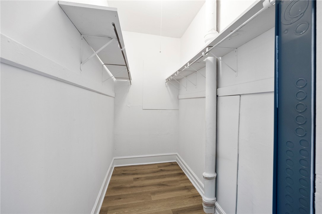 201 South 8th Street Easley, SC 29640 - Photo 18 of 28 Ample shelving maximizes storage space in this wood-floored closet.