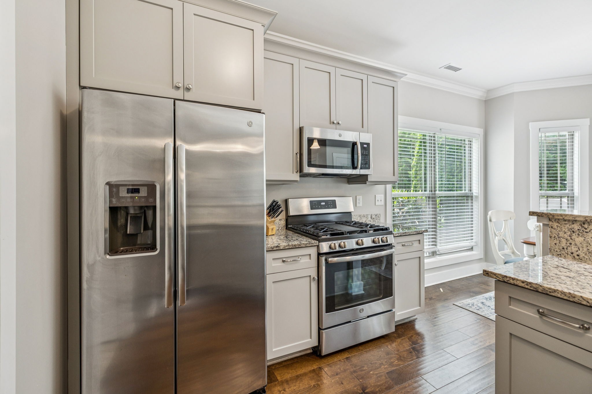 146 Island Way Winchester, TN 37398 - Photo 17 of 49 a kitchen with stainless steel appliances a refrigerator stove and microwave