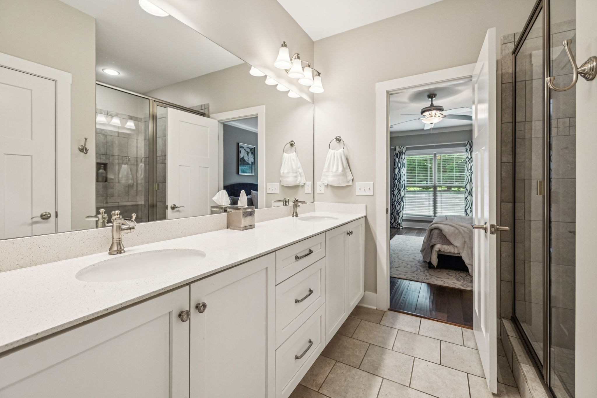 146 Island Way Winchester, TN 37398 - Photo 20 of 49 a en suite bathroom with a double vanity sink and a mirror