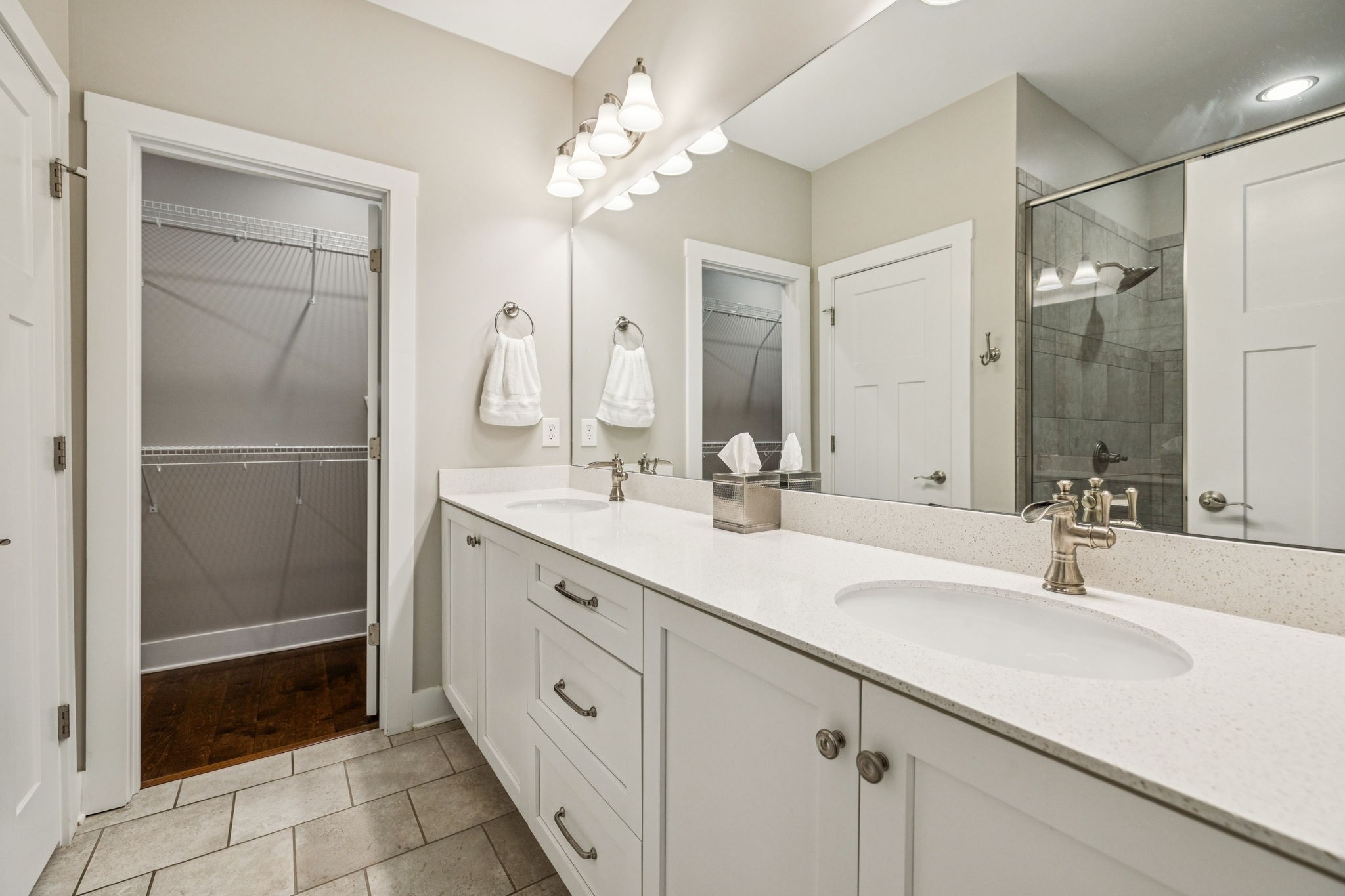 146 Island Way Winchester, TN 37398 - Photo 22 of 49 a bathroom with a double vanity sink mirror and shower