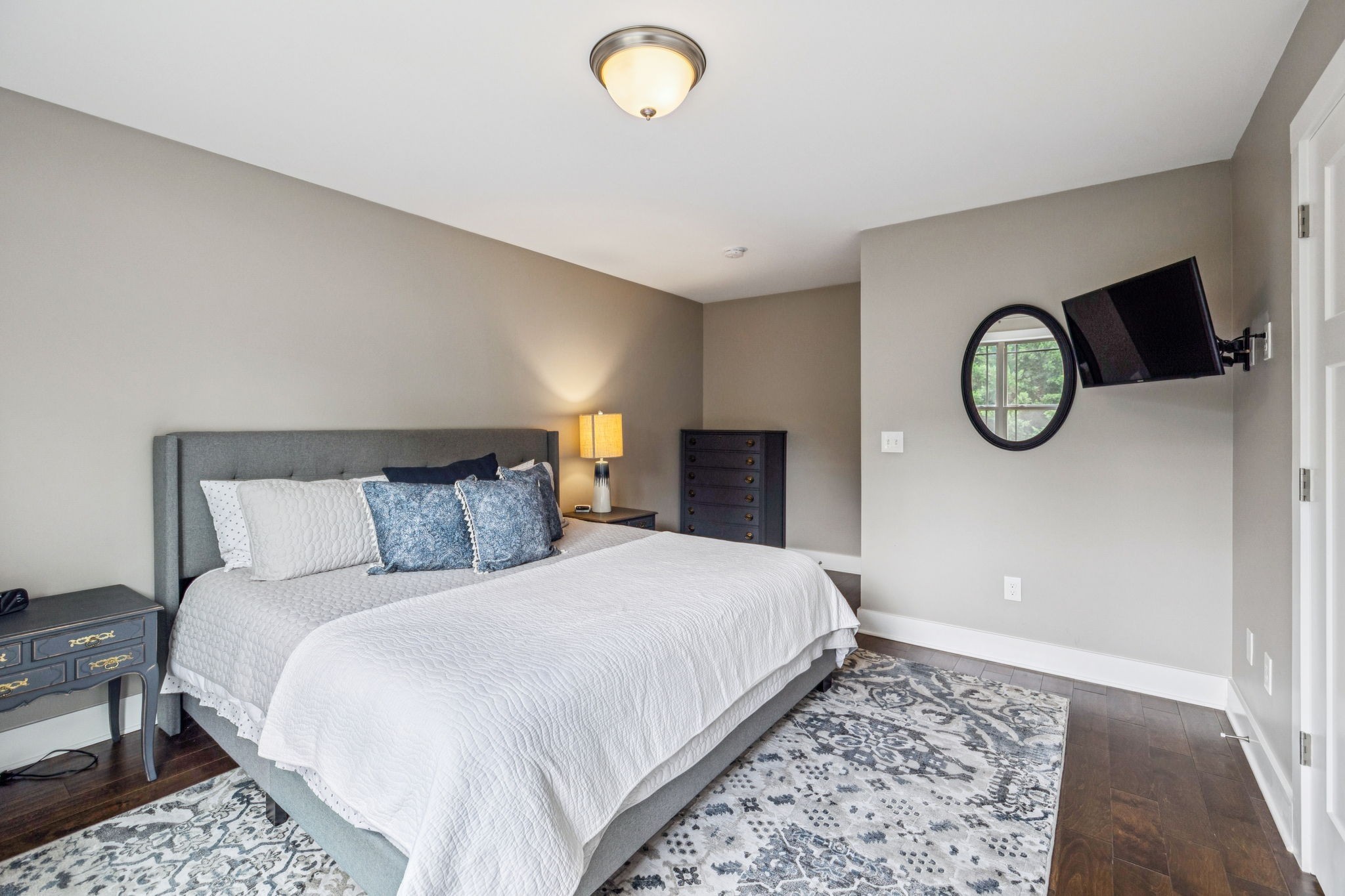 146 Island Way Winchester, TN 37398 - Photo 27 of 49 a bedroom with a bed and a lamp on dresser