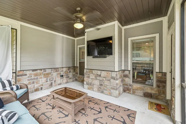 a bathroom with a sink a mirror and shower