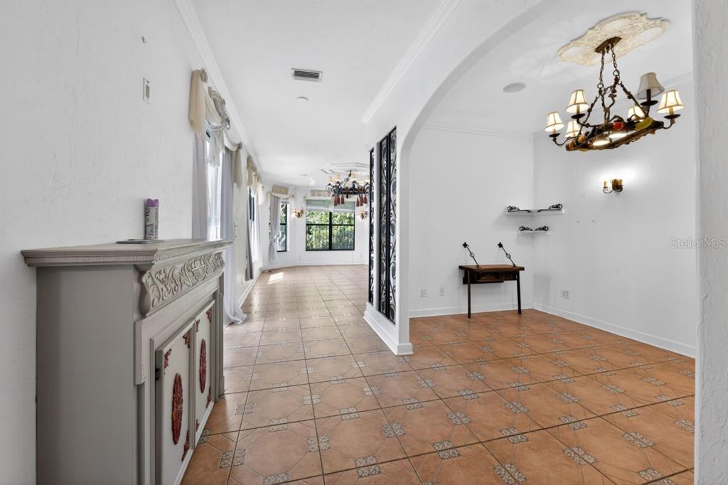 328 Sorrento Street Venice, FL 34285 - Photo 26 of 49 a view of a hallway with washer and dryer