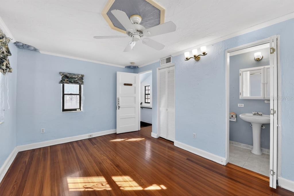 328 Sorrento Street Venice, FL 34285 - Photo 33 of 49 wooden floor in an empty room with a window