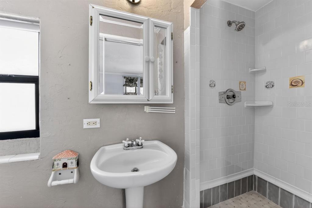 328 Sorrento Street Venice, FL 34285 - Photo 36 of 49 a bathroom with a sink and a mirror