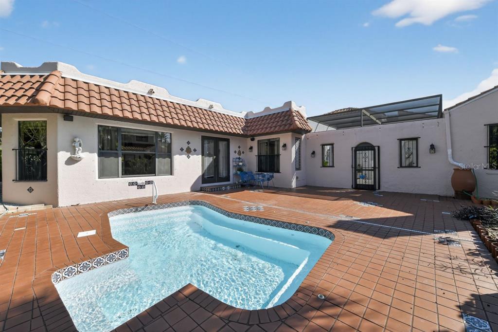 328 Sorrento Street Venice, FL 34285 - Photo 46 of 49 a house view with a outdoor space