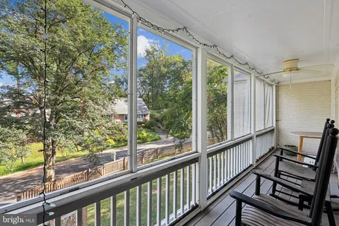 a view of a porch with a large window