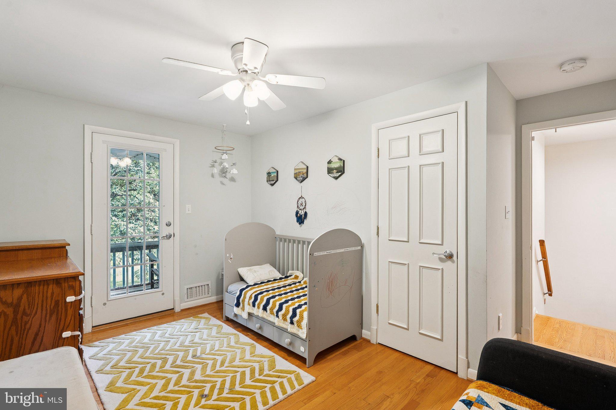 1432 Crestridge Drive Silver Spring, MD 20910 - Photo 22 of 52 a living room with furniture and wooden floor