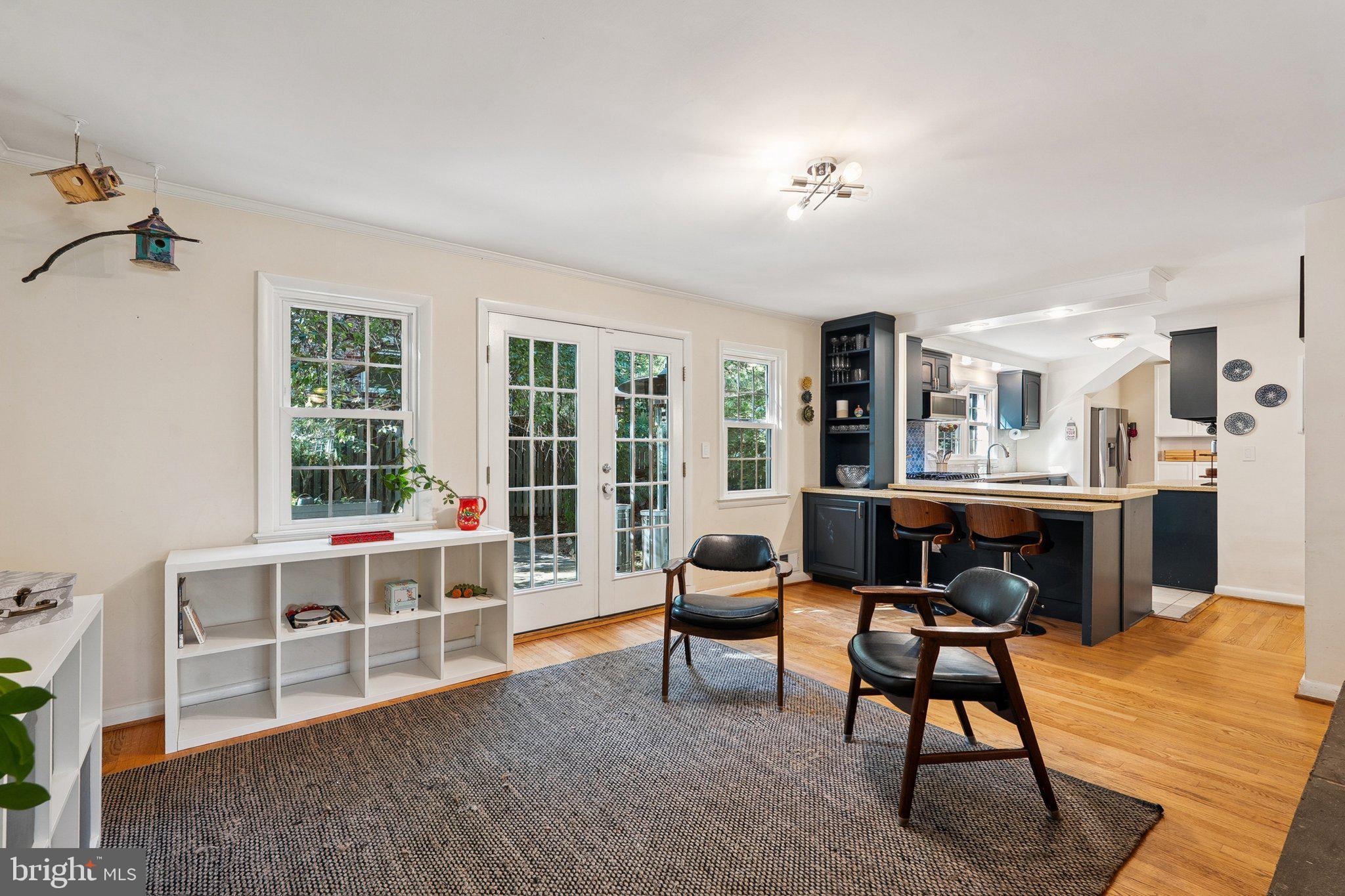 1432 Crestridge Drive Silver Spring, MD 20910 - Photo 37 of 52 a living room with furniture and a table