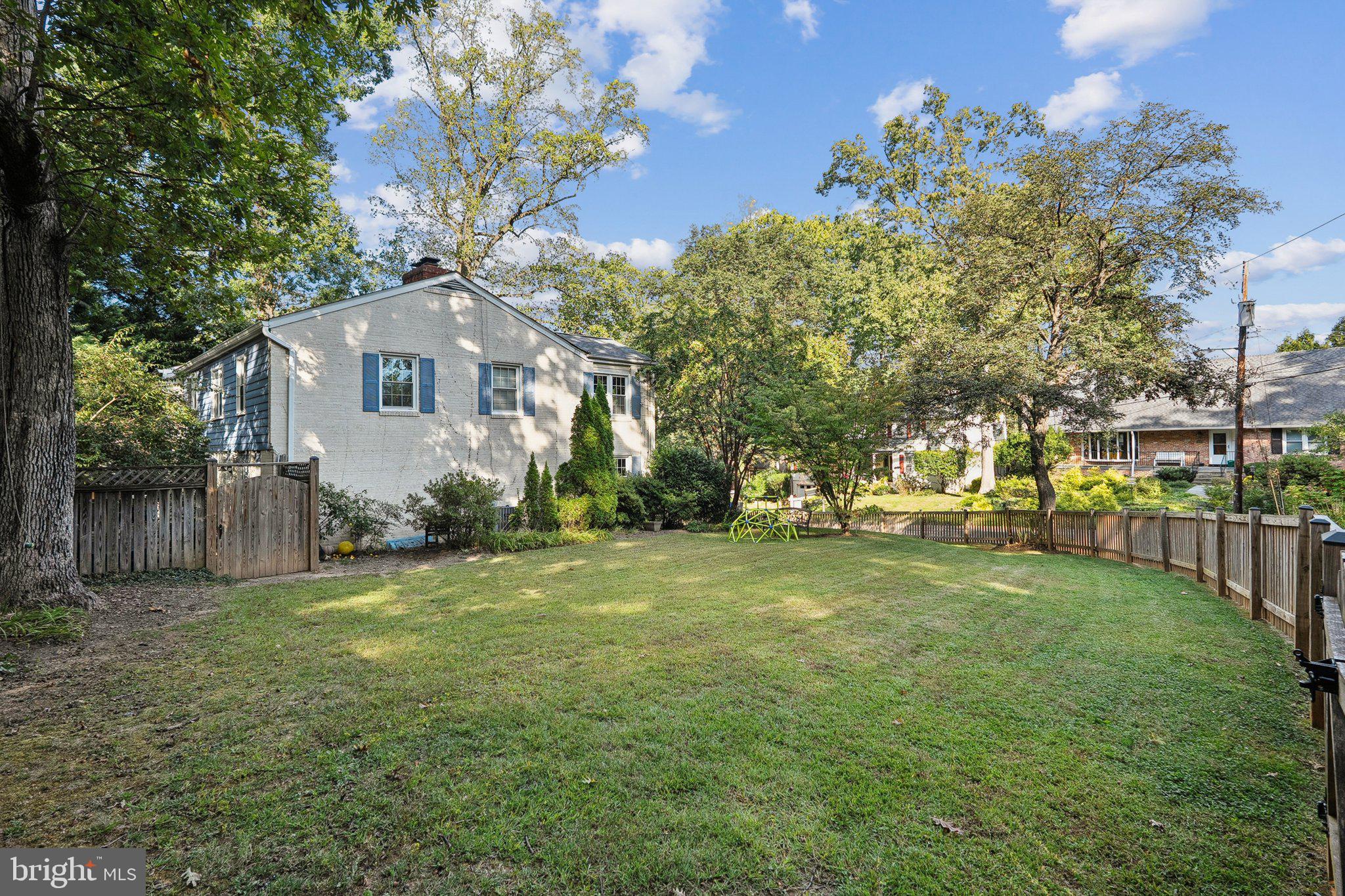 1432 Crestridge Drive Silver Spring, MD 20910 - Photo 48 of 52 a front view of house with yard and trees