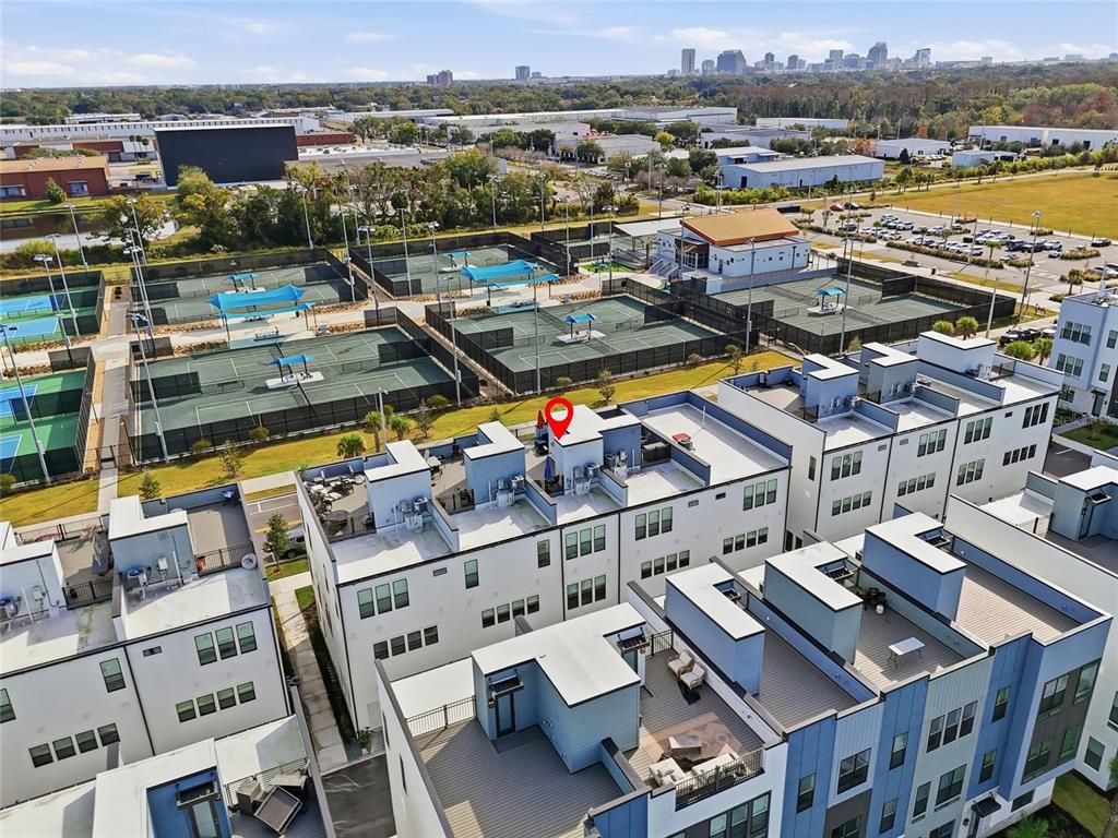 2038 Packing District Way Orlando, FL 32804 - Photo 2 of 39 an aerial view of residential houses with outdoor space