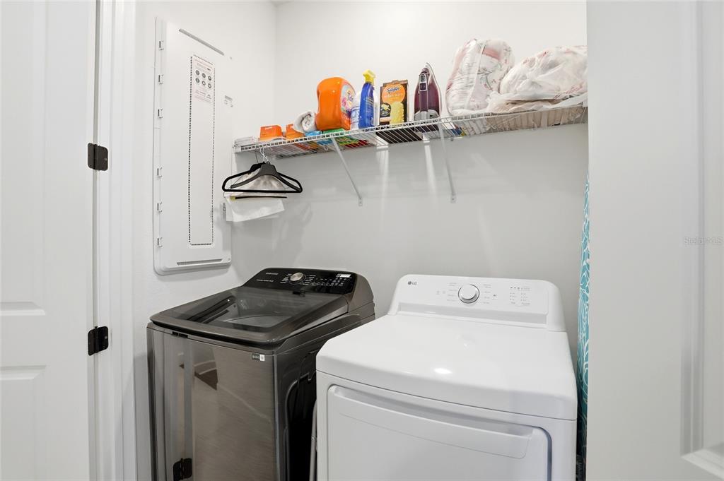 2038 Packing District Way Orlando, FL 32804 - Photo 26 of 39 a utility room with dryer and washer