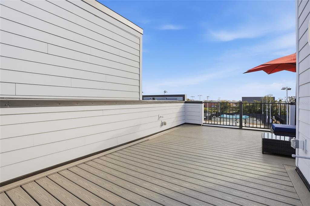 2038 Packing District Way Orlando, FL 32804 - Photo 29 of 39 a view of a terrace with wooden floor