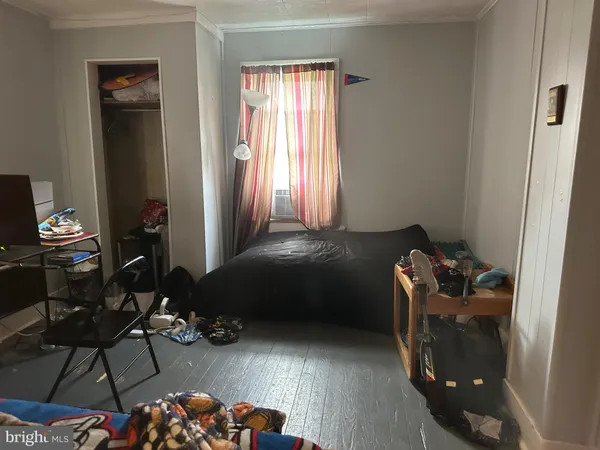 a room with furniture and a window